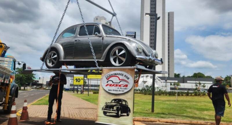 Fuscas no estacionamento do Comper Itanhangá durante o evento solidário