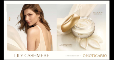 Creme acetinado Lily Cashmere de O Boticário com textura sofisticada e embalagem elegante sobre superfície iluminada