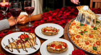 Casal compartilhando pizza artesanal e vinho durante jantar romântico preparado pela Al Forno Pizzaria em Campo Grande.