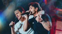 Dupla Hugo & Guilherme durante apresentação no palco. Os cantores são os anfitriões do festival No Pelo 360, que acontece em Campo Grande no dia 26 de setembro.