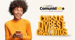Pessoa segurando um celular ao lado da mensagem "Cursos Livres Gratuitos" na campanha Campus ComunidAde, que divulga capacitações gratuitas.