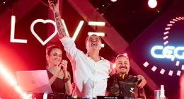 Público acompanha apresentação de DJs durante o pôr do sol na festa LOVE, em Campo Grande.